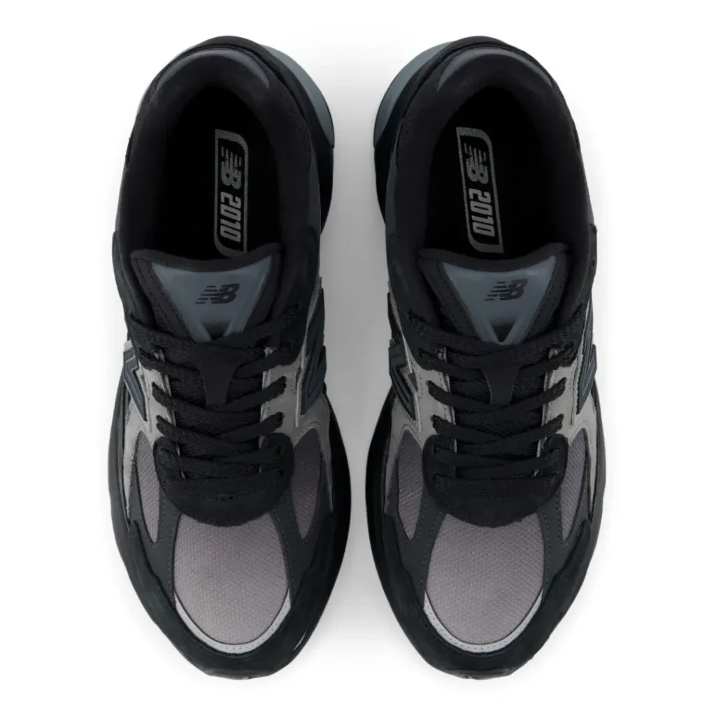 Top-down view of the New Balance U2010 "Black/Harbor Grey" highlighting the grey mesh toe box, black laces, padded tongue, and NB 2010 branded insole