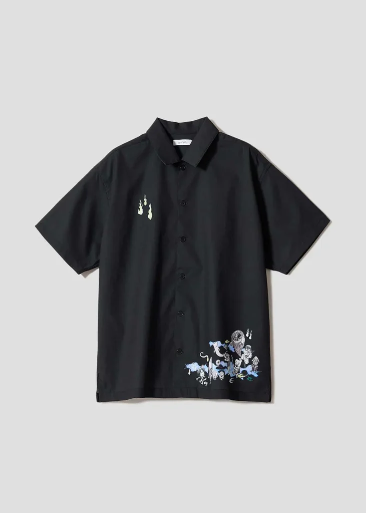 Black button-up camp shirt with small ghost flame embroidery on the chest and a GeGeGe no Kitarō illustration printed near the lower hem