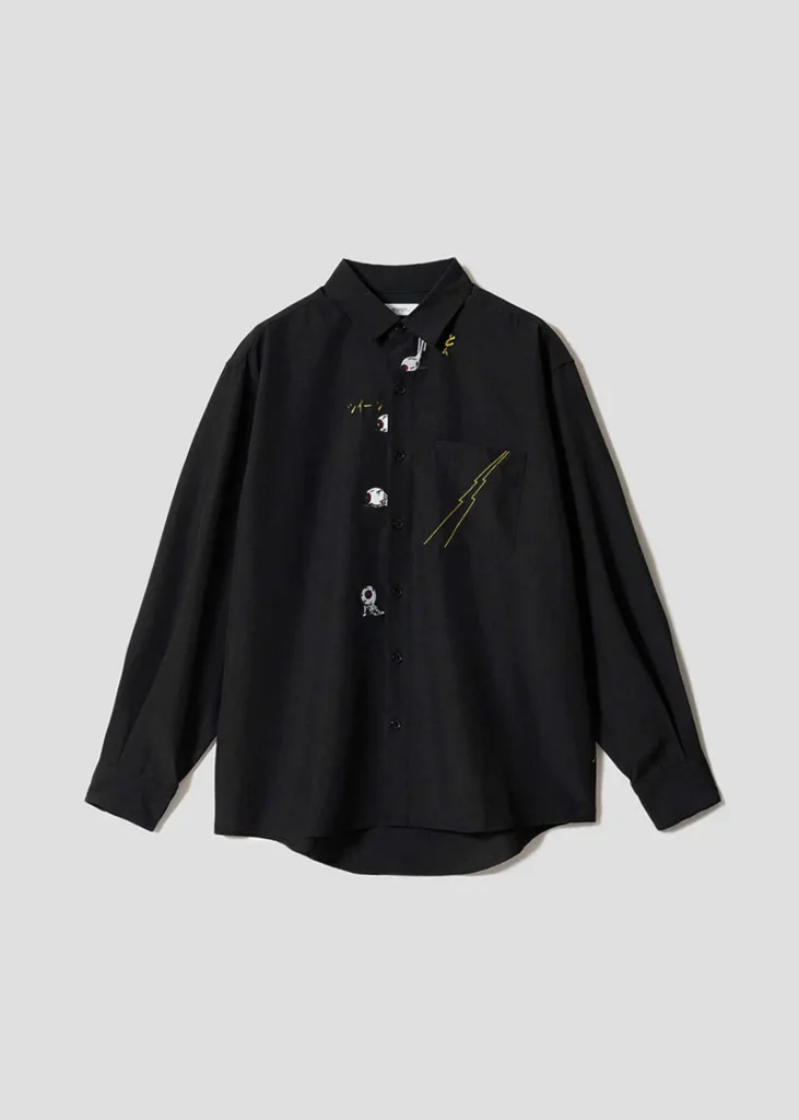 Black button-up shirt with embroidered Eyeball Father motifs running along the placket and a yellow lightning graphic on the chest pocket
