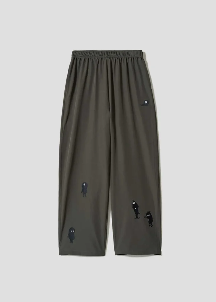 Olive wide-leg pants embroidered with scattered silhouettes of GeGeGe no Kitarō yokai across both leg
