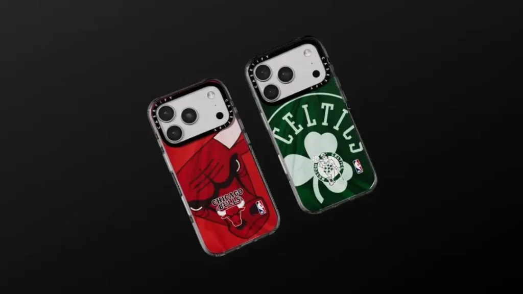 Two iPhone cases on a black background: left case features a red Chicago Bulls graphic with the team logo, right case features a dark green Boston Celtics graphic with the shamrock logo