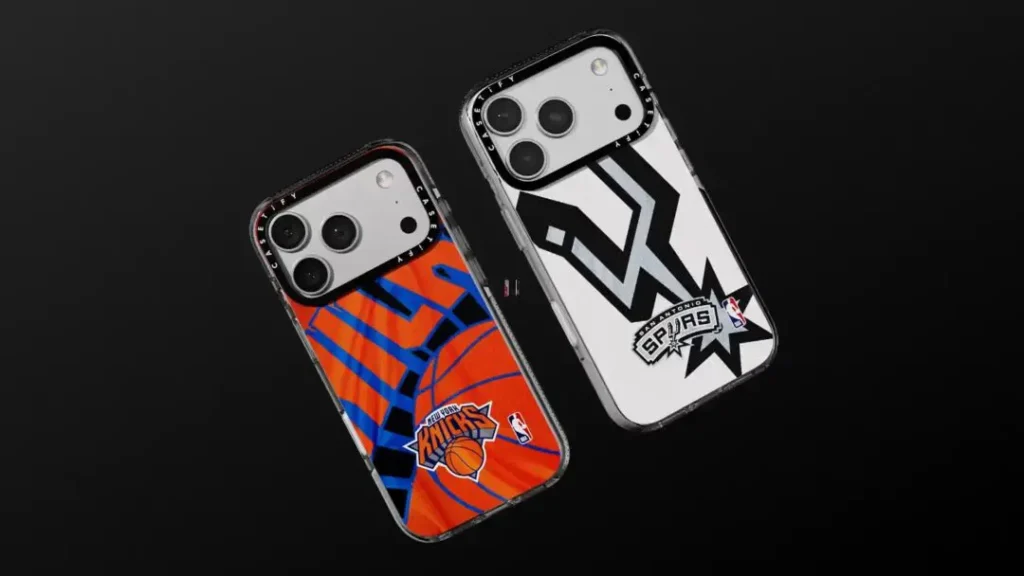 Two iPhone cases on a black background: left case has an orange and blue New York Knicks graphic with the team logo, right case has a black-and-white San Antonio Spurs graphic with the star logo.