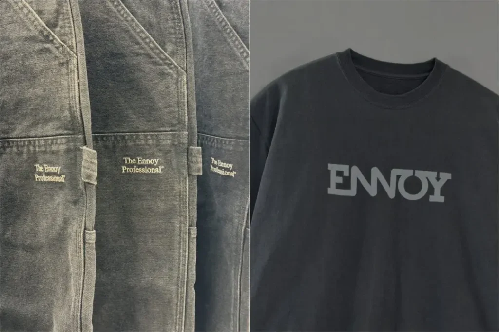 Close-up comparison of The Ennoy Professional washed black carpenter shorts and a charcoal ENNOY logo Tee, highlighting the faded garment dye, embroidered branding, and oversized graphic print