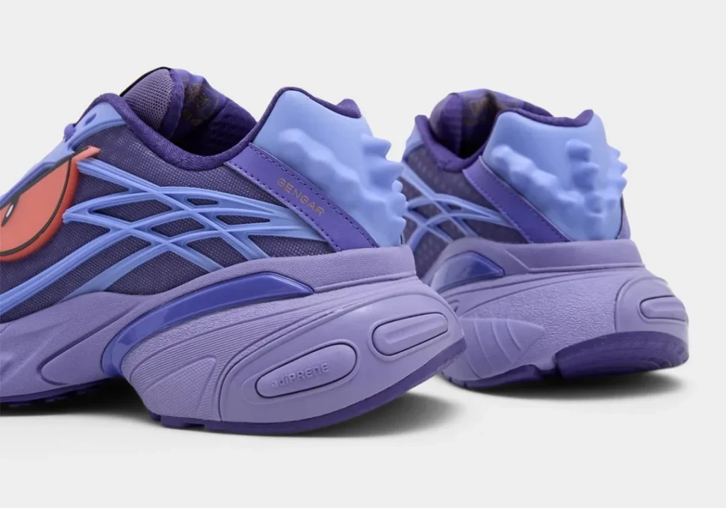 Rear three-quarter view of the Gengar-inspired adidas running shoes showcasing sculpted lavender midsoles, ghost-shaped heel counter, purple mesh construction, and subtle "GENGAR" brand