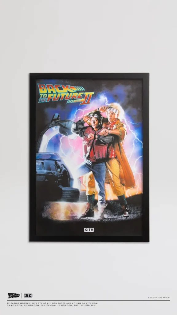 Framed Back to the Future Part II artwork featuring Marty McFly and Doc Brown standing in front of the DeLorean with lightning in the background