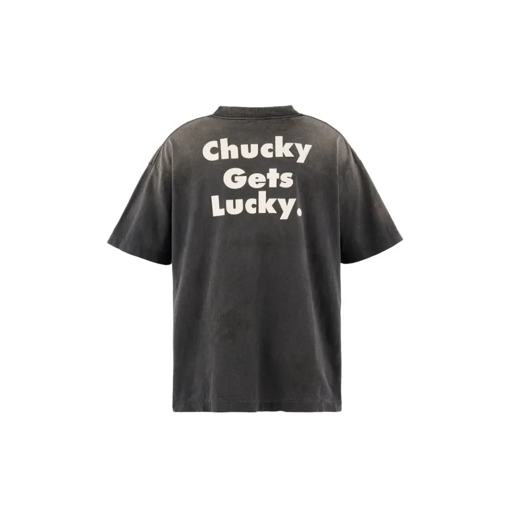 Rear product shot of the faded black "Chucky Gets Lucky." Tee isolated on a white background, emphasizing the oversized back print
