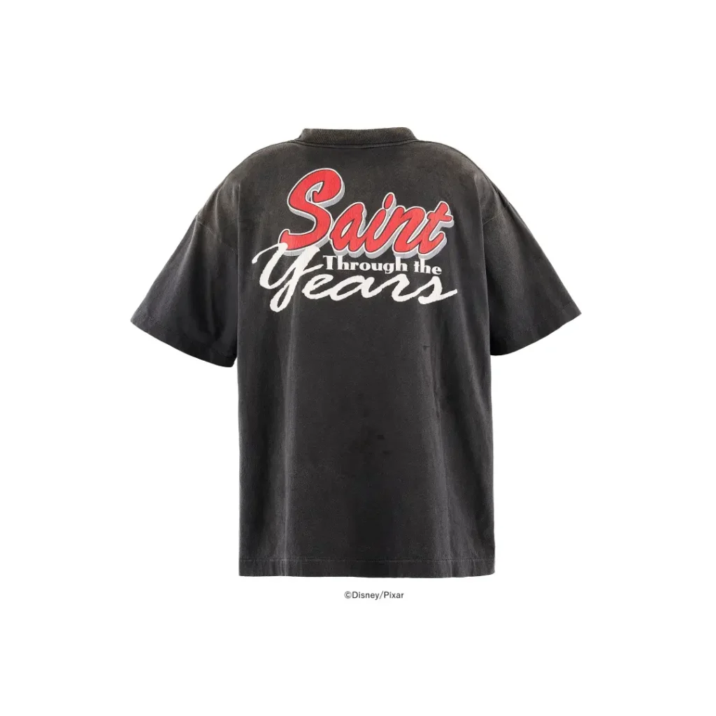 Rear product shot of the faded charcoal "Saint Through the Years" oversized Tee isolated on a white background, emphasizing the large back graphic