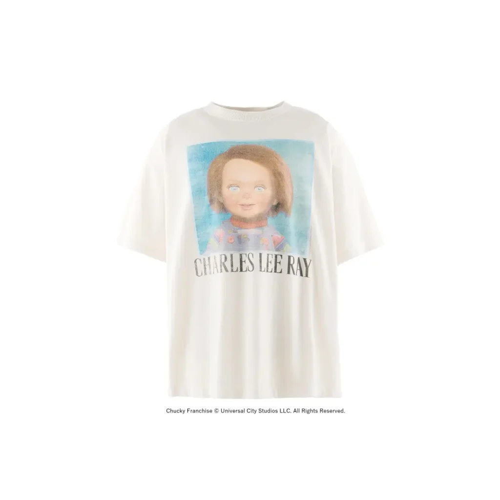 Front product shot of an oversized white Tee eaturing a vintage-style Charles Lee Ray portrait graphic across the chest, finished with bold serif lettering beneath on a clean white background