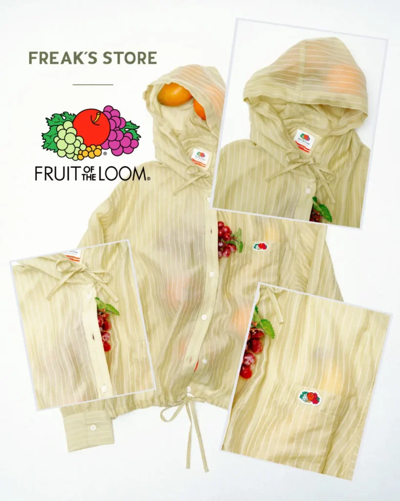 Pale yellow striped hooded overshirt from the FREAK'S STORE × Fruit of the Loom collide displayed with close-up detail insets, embroidered fruit logo, and fresh fruit styling accent