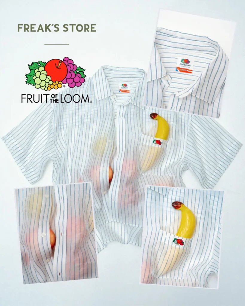 White striped short-sleeve button-up shirt from the FREAK'S STORE × Fruit of the Loom collaboration presented with detail insets, embroidered fruit logo, and playful fruit-filled chest pocket style