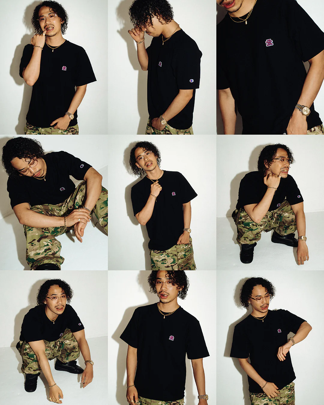 Nine-panel campaign collage featuring a model wearing the Champion x BLACK EYE PATCH black T-shirt. The oversized tee carries a small embroidered collaboration logo on the left chest and a Champion 'C' patch on the sleeve. Across the grid, the model poses standing and crouching against a white studio backdrop, pairing the shirt with camouflage cargo pants, black boots, gold jewelry, clear-framed glasses, and visible gold grills.