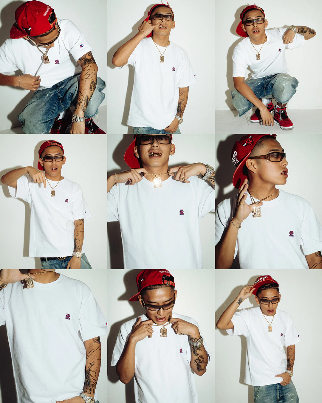 Nine-panel campaign collage featuring a model wearing the Champion x BLACK EYE PATCH white T-shirt. The oversized tee is detailed with a small embroidered collaboration logo on the left chest and a Champion 'C' patch on the sleeve. Throughout the studio portraits, the model styles the shirt with a red Chicago Bulls cap, oversized sunglasses, distressed blue jeans, red and black sneakers, layered gold jewelry, tattoos, and gold grills against a clean white backdrop.