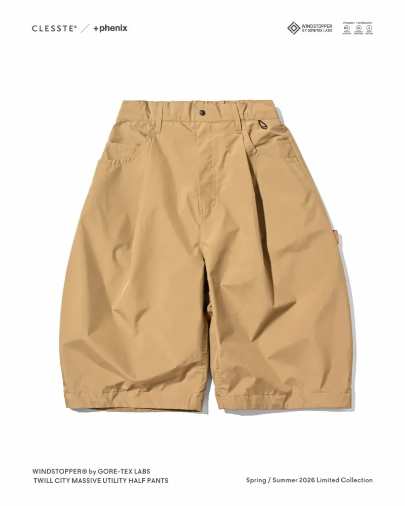 ront product view of the khaki CLESSTE × +phenix utility half pants with wide balloon silhouette, front pleats, and minimalist technical style
