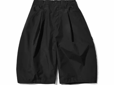 Front product view of the black CLESSTE × +phenix WINDSTOPPER by GORE-TEX LABS Twill City Massive Utility Half Pants with oversized wide-leg cut, belt loops, and clean minimalist construction