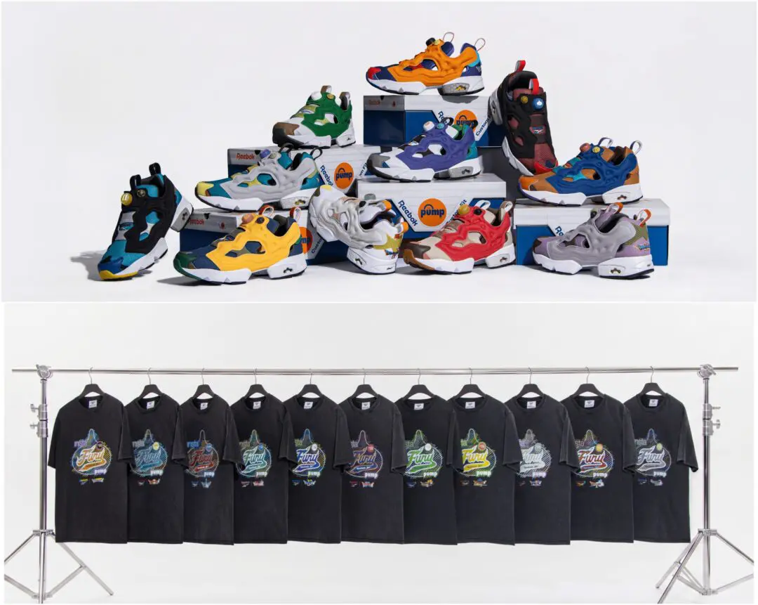 Reebok × Dragon Quest collaboration featuring eleven Instapump Fury sneakers displayed on stacked shoeboxes above a clothing rack of matching black graphic T-shirts, each inspired by a different Dragon Quest title.