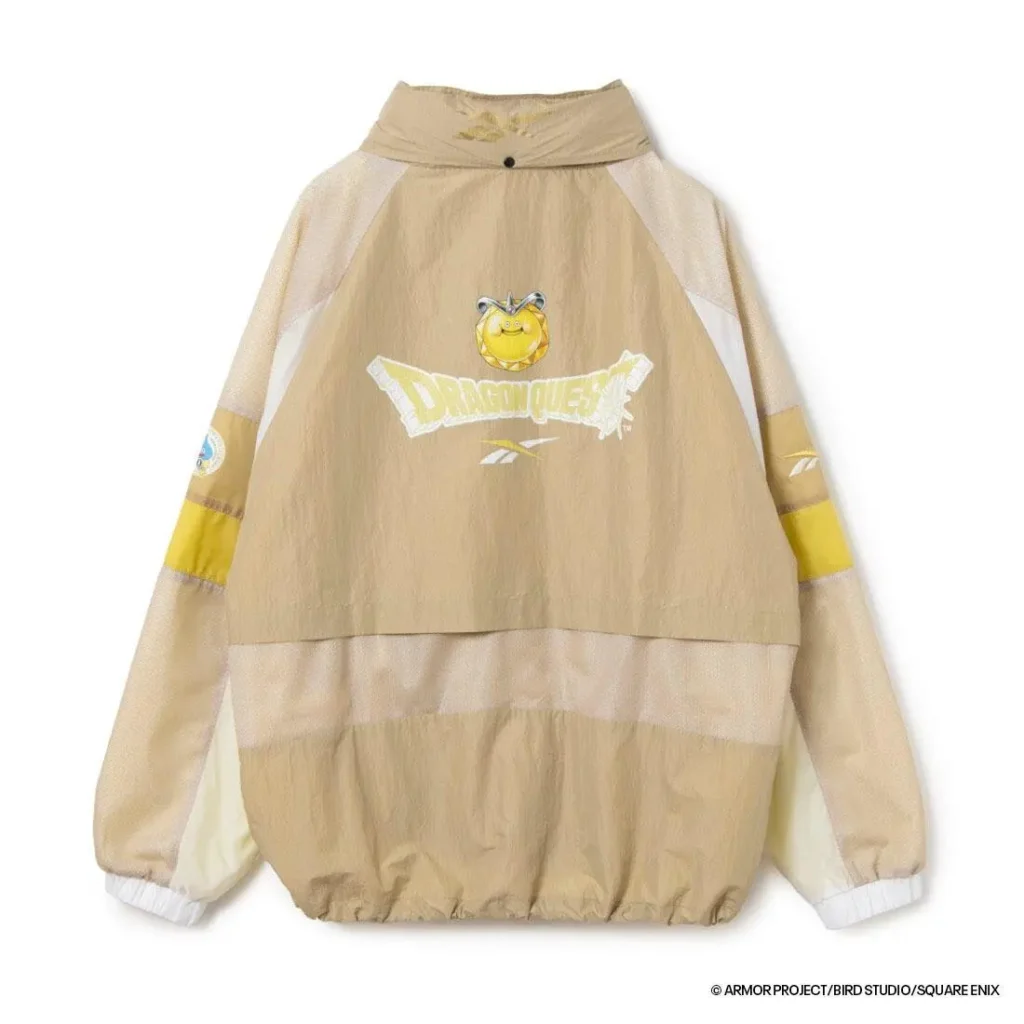 Rear view of the beige jacket highlighting a large Dragon Quest logo with a golden Slime character, mesh back panel, and adjustable hem toggle