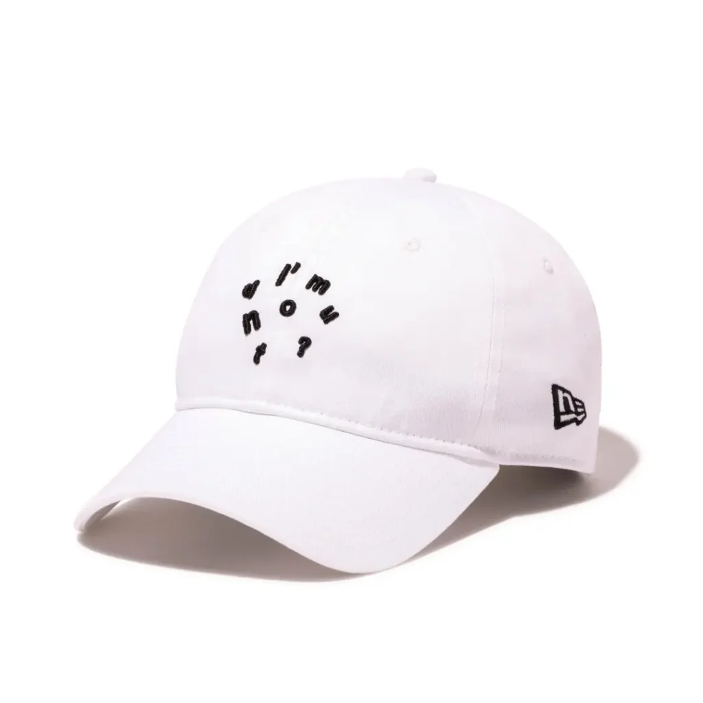 White New Era "I'm Donut?" dad cap isolated on a white background with black embroidered lettering arranged in a circular pattern and the embroidered New Era logo on the side