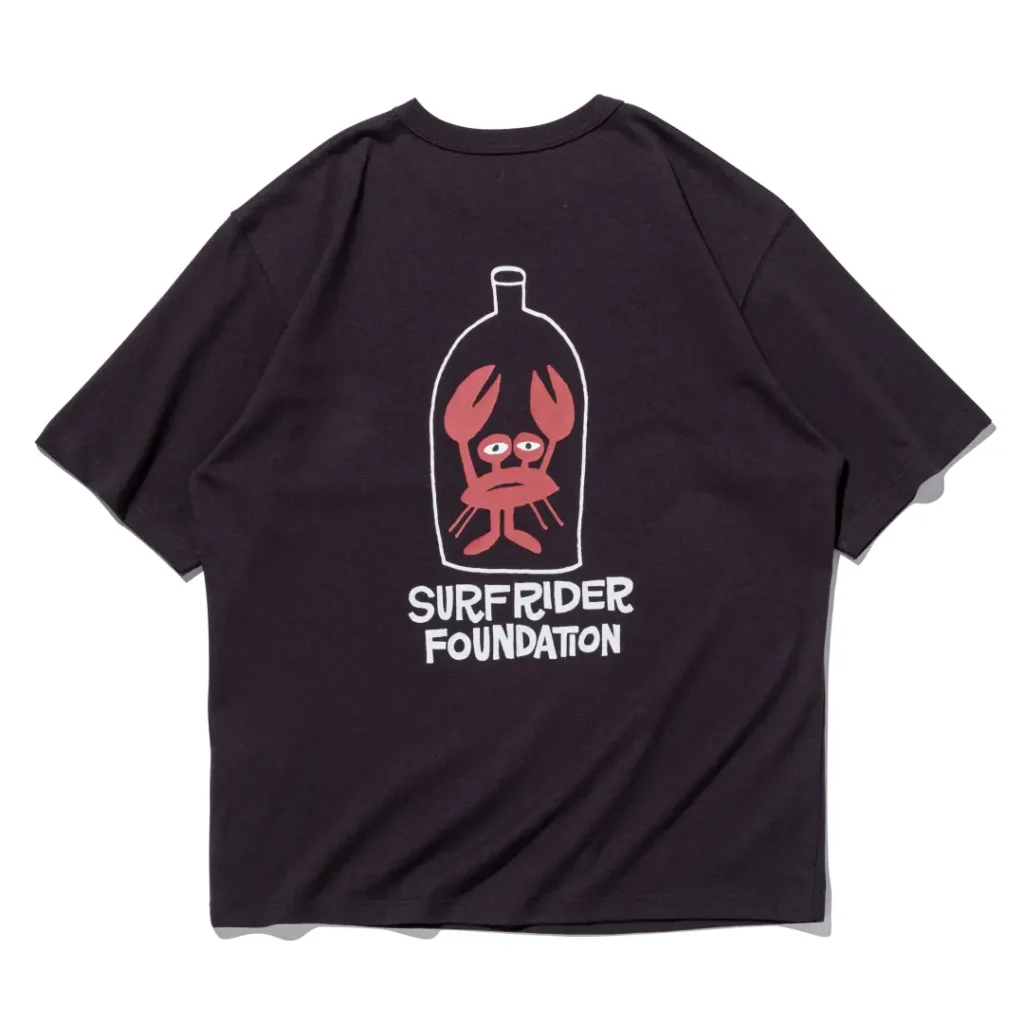 Black Tee back displaying a large bottle graphic with a red crab illustration above bold white Surf Rider Foundation brand