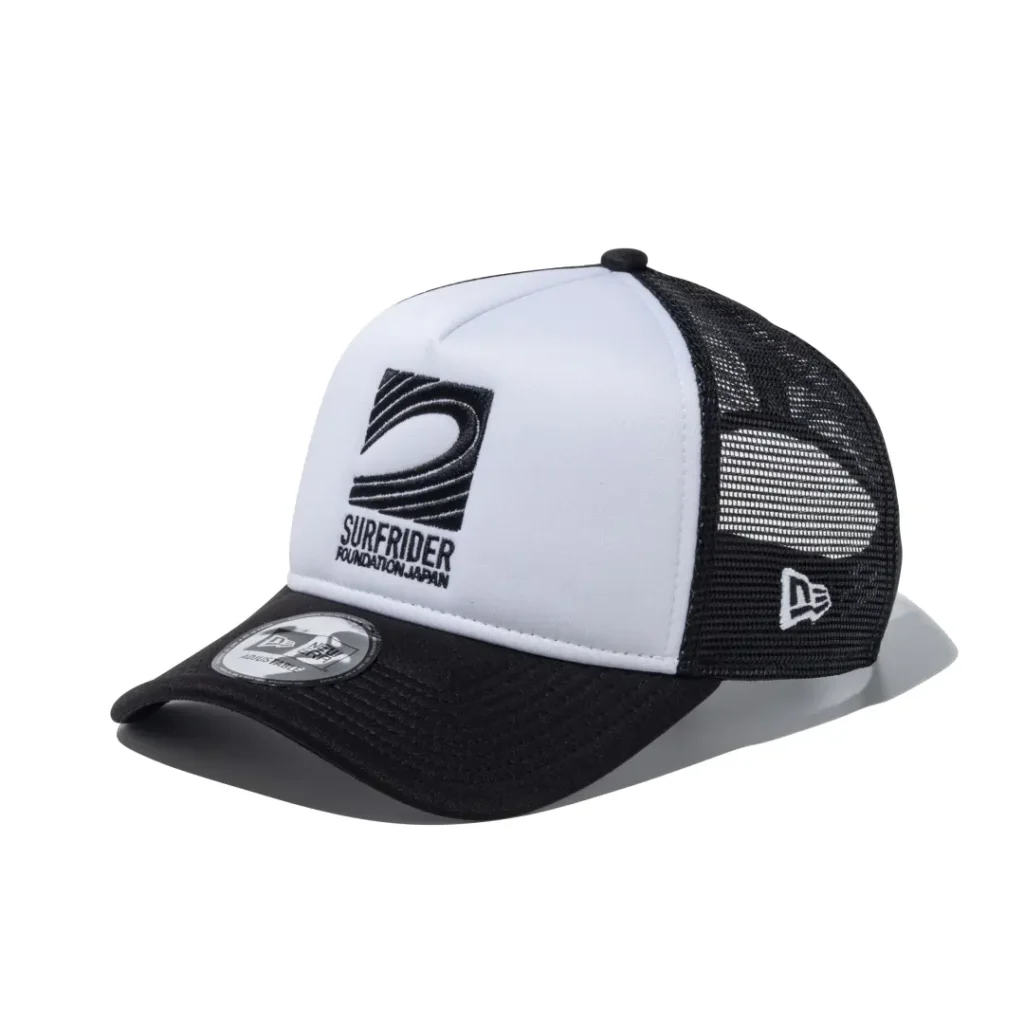 Black and white mesh trucker cap featuring the Surf Rider Foundation Japan wave logo embroidered on the front foam panel