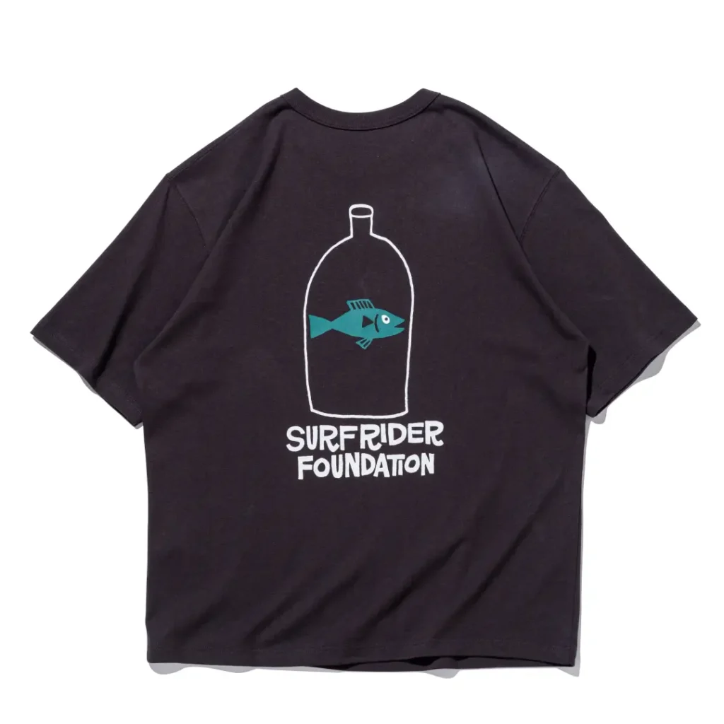 Black T-shirt back displaying a large bottle graphic with a teal fish illustration above bold white Surf Rider Foundation brand