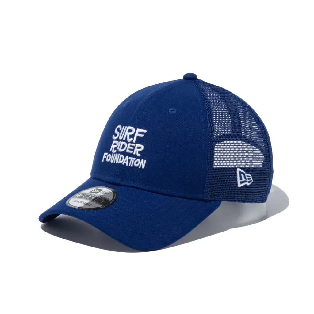 Royal blue mesh trucker cap with stacked white Surf Rider Foundation embroidery on the front and breathable mesh side panel