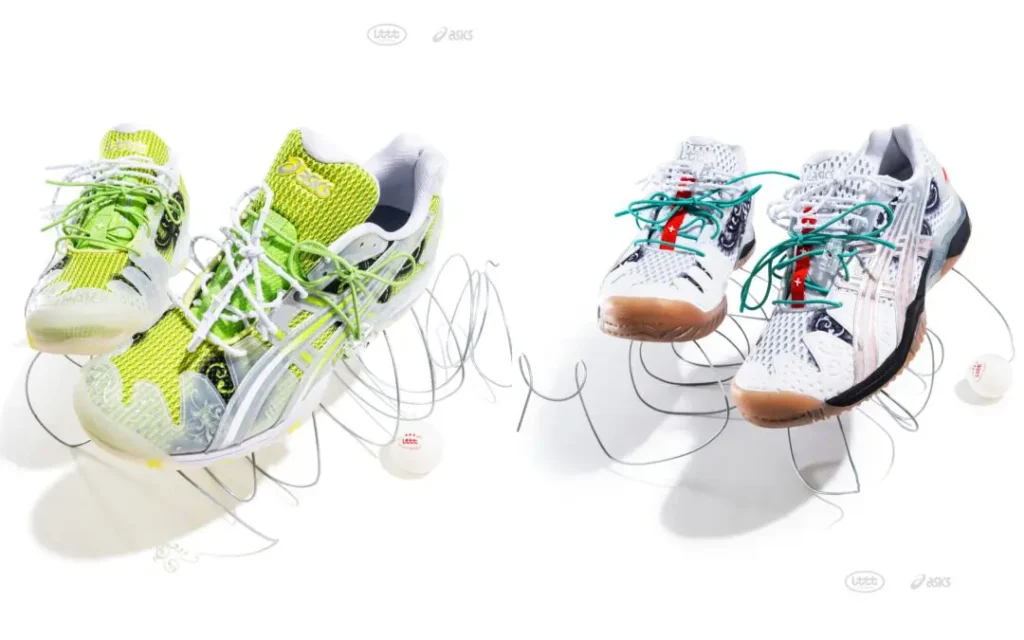 Two ASICS x Lttt table tennis shoes displayed on a white studio background, showcasing the collection's white and lime green colorways with translucent overlays, ornate black graphics, dual-lace systems, and sculptural wire stands alongside branded table tennis balls