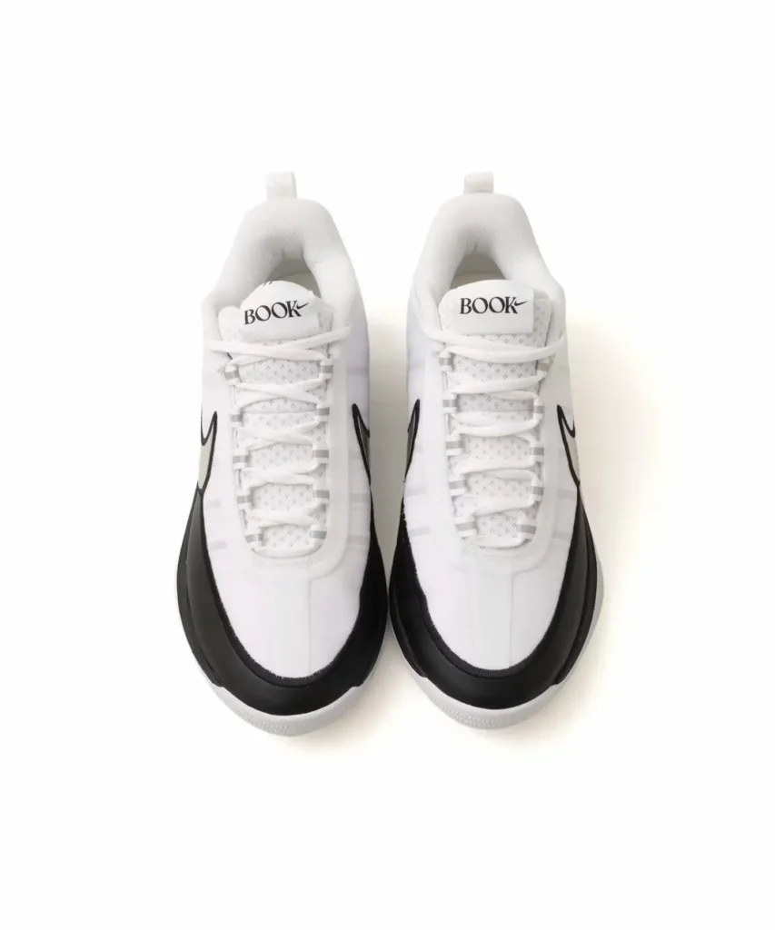 Top-down view of the Nike BOOK Chapter Two shoe revealing breathable white mesh tongues, white laces, and BOOK-branded tongue label
