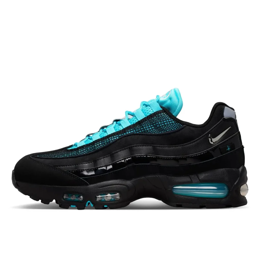 Lateral side profile of the Nike Air Max 95 in a black and aqua colorway, showcasing gradient mesh panels, glossy black overlays, visible blue-tinted Air Max units, and a black rubber outsole