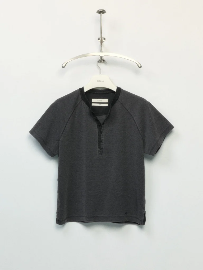 Charcoal short-sleeve henley T-shirt with raglan sleeves, three-button placket, and min design displayed on a hanger