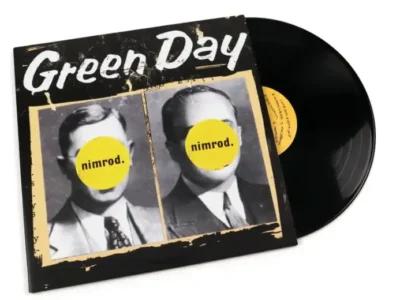 A vinyl copy of Green Day's 1997 album Nimrod displayed partially outside its sleeve