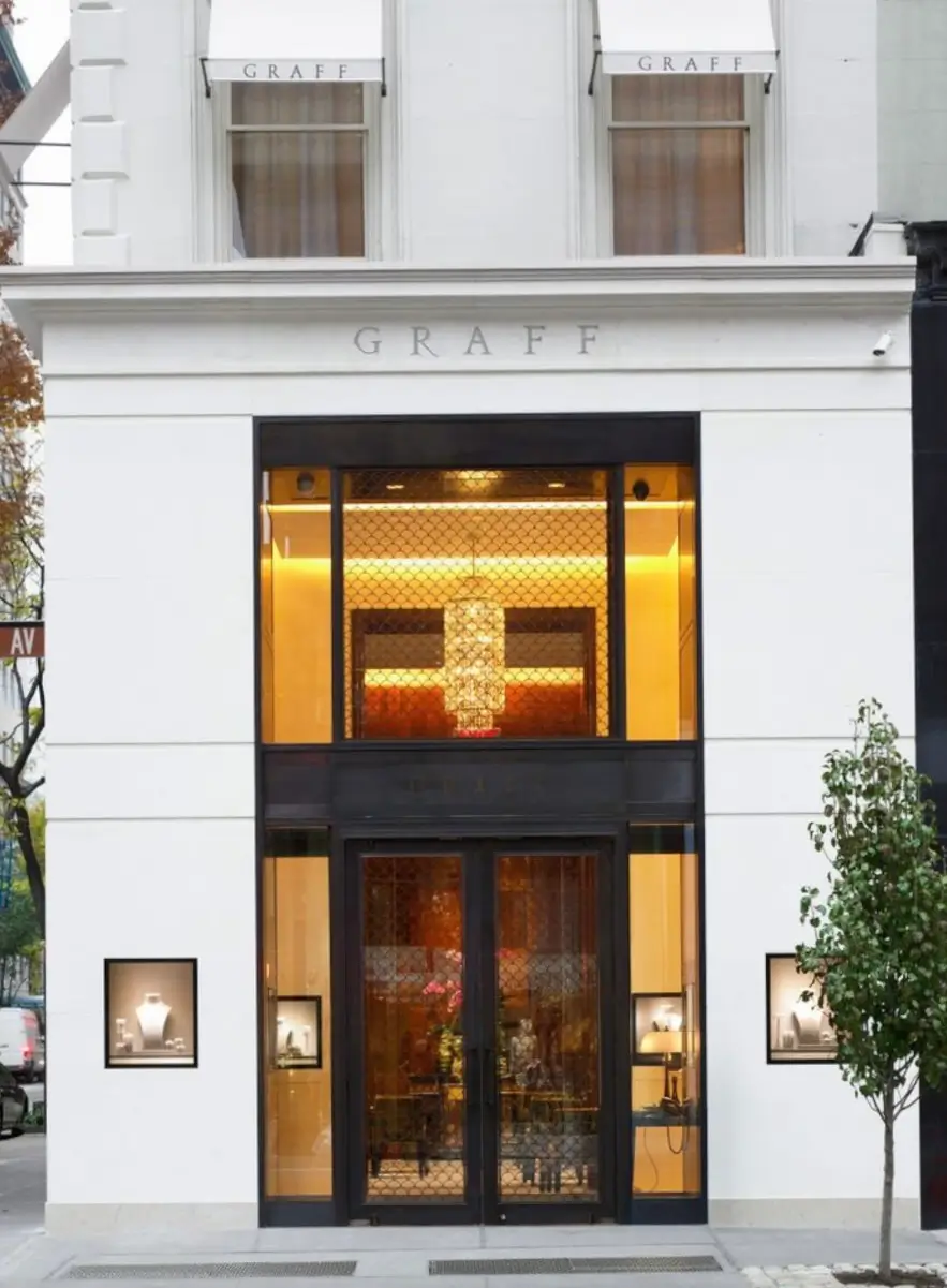 Exterior of Graff luxury jewelry boutique with illuminated entrance and elegant storefront design