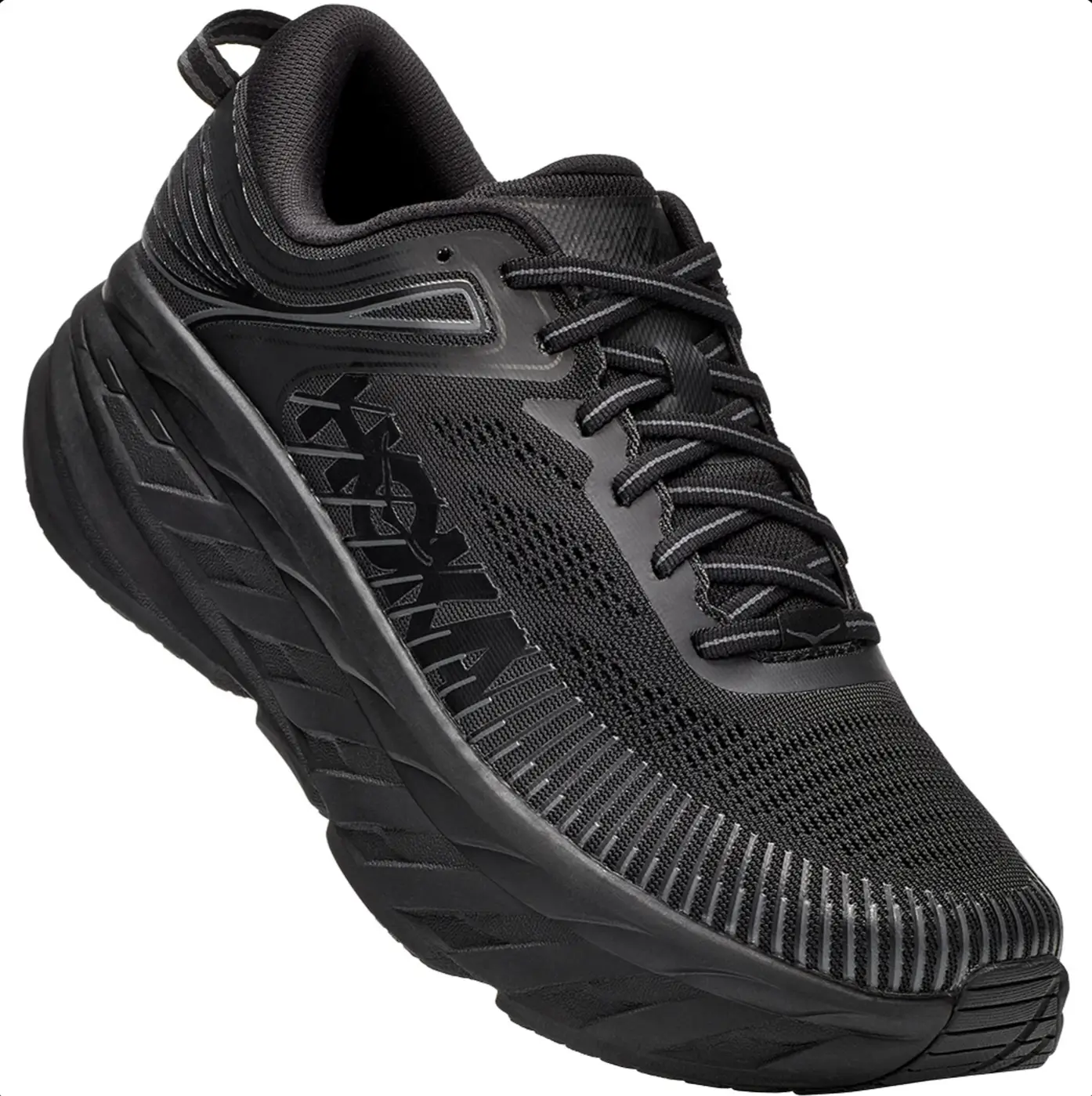 Close-up angled view of the black HOKA Project Transport featuring a breathable engineered mesh upper, tonal overlays, oversized black HOKA side branding, reflective laces, and a sculpted all-black cushioned midsole.