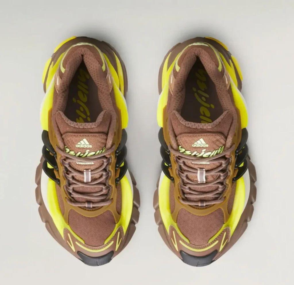 Top-down view of the adidas x Ne.jelly Virginia shoe highlighting the brown mesh upper, co-branded tongue, rope laces, neon yellow overlays, and cushion collar design
