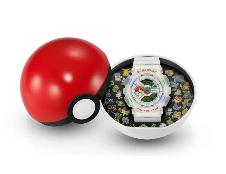 Pokémon x G-SHOCK GA-110 displayed inside a Poké Ball-shaped collector's case, surrounded by colorful artwork of multiple Pokémon characters on the presentation insert
