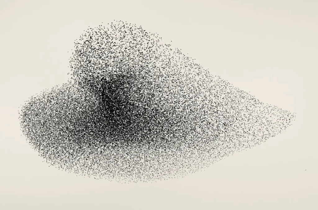 Dense clusters of black specks converge into a triangular, mountain-like formation, with the darkest concentration at its center fading gradually into a soft halo of scattered point