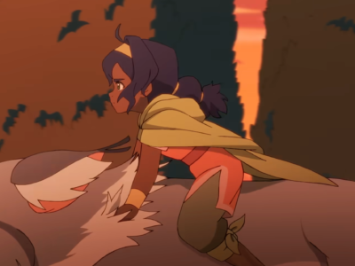 Animated scene showing Pavi riding a massive white, cat-like creature through towering hedges at sunset. Wearing a green cape and coral outfit, she leans forward with determination as birds fly overhead against a glowing orange sky, capturing a sense of urgency and adventure