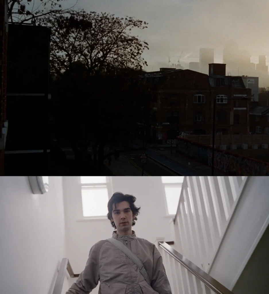 Split image showing a backdrop London skyline through winter haze above a low-angle portrait of a male model wearing a pale utility jacket with a crossbody strap on a white stairwell