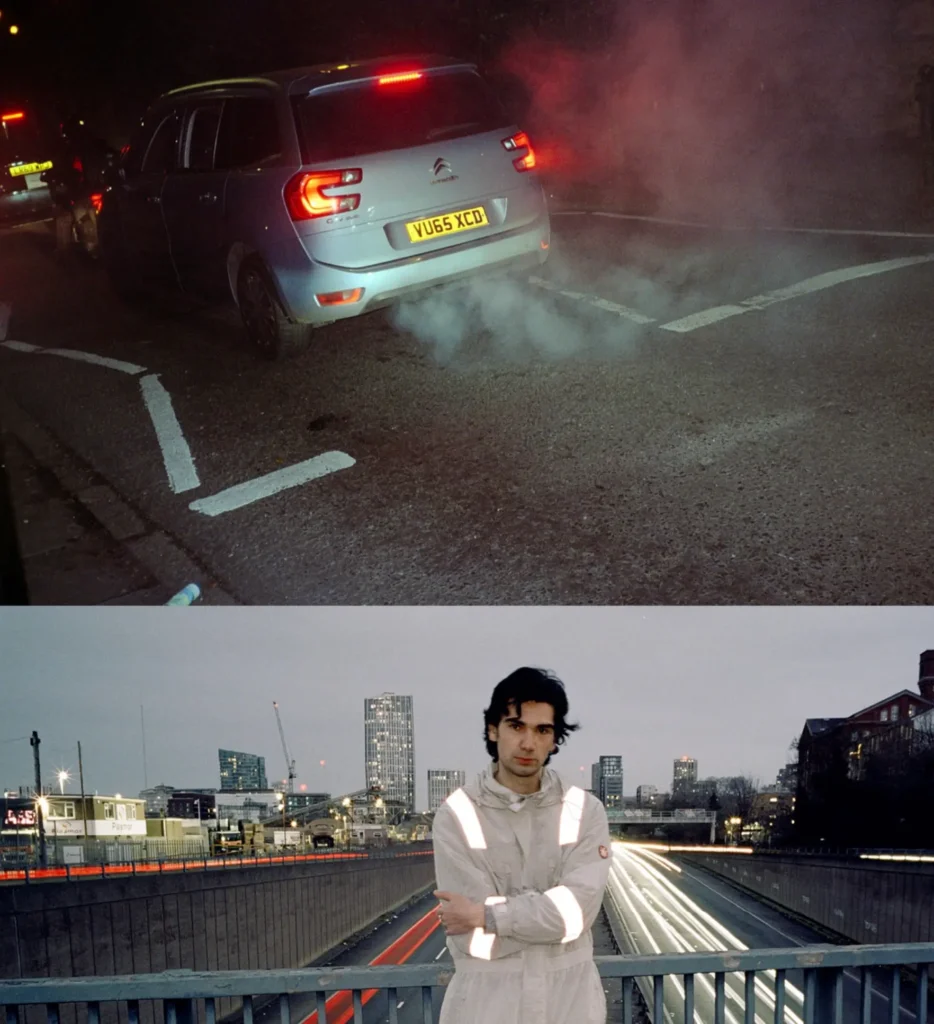 Split nighttime composition pairing exhaust smoke behind a silver car with a male model in a pale reflective technical outfit standing above a motorway filled with long vehicle light trail
