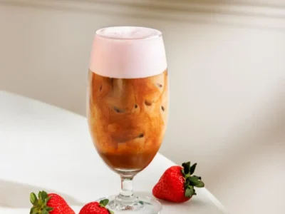 Ralph’s Coffee Trades Its Green Awnings for Strawberry Pink This Summer