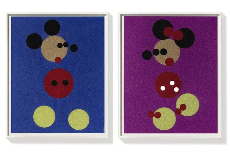 Framed Damien Hirst Mickey and Minnie glitter screenprints displayed side by side, with blue and purple backgrounds.