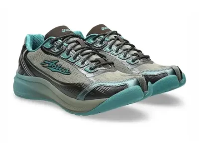 Three-quarter front view of the Kiko Kostadinov x ASICS running shoes in silver, black, and green, emphasizing the split-toe design, layered upper, and sculpted foam sole