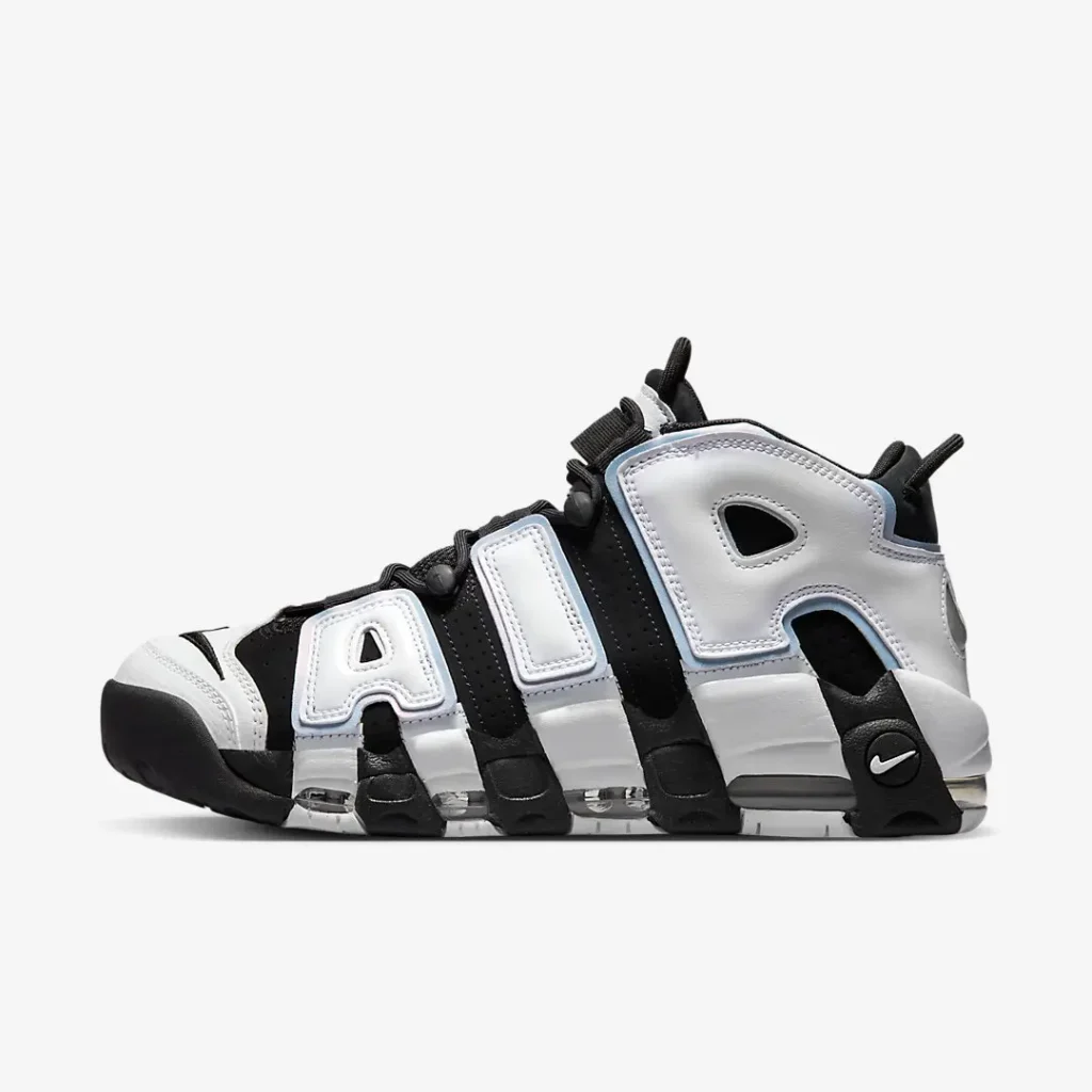Nike Air More Uptempo "Cobalt Bliss" sneaker featuring oversized white leather "AIR" lettering, black upper, visible Air cushioning, and light blue iridescent accent