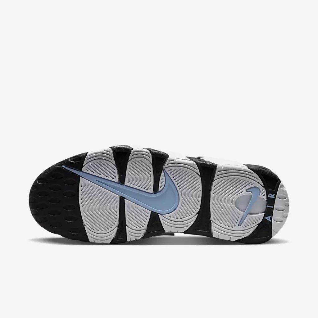 White and black rubber outsole with a large Cobalt Bliss blue Nike Swoosh spanning the midfoot, circular traction pods, and view "AIR" branding at the heel