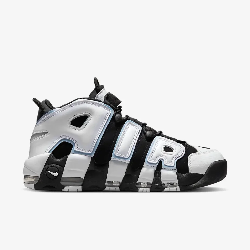 Medial profile of the Nike Air More Uptempo highlighting white leather overlays, black perforated underlays, exposed Air units, and metallic light blue trim