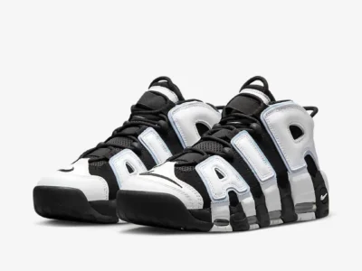 Angled view of the Nike Air More Uptempo "Cobalt Bliss" emphasizing the sculpted midsole, oversized "AIR" lettering, visible Air cushioning, and contrasting black and white tincture blocking