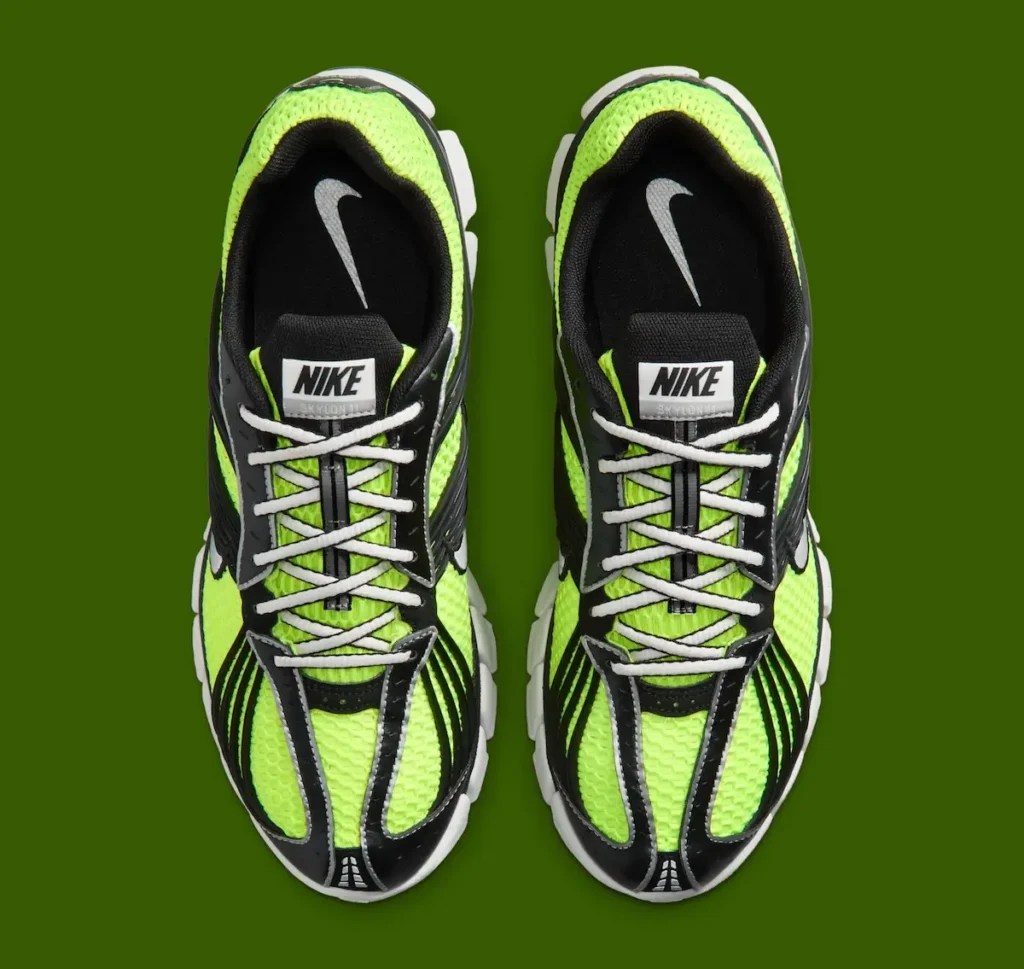Top-down view of the Nike Zoom Skylon 11 'Volt' featuring bright volt open-mesh uppers, black synthetic overlays, metallic silver accents, white laces, Nike-branded tongue labels, and segmented white Zoom sole unit