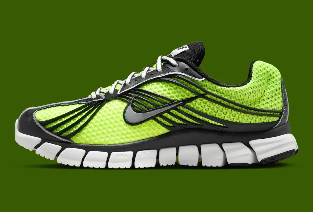 Lateral side profile of the Nike Zoom Skylon 11 'Volt' with bright volt mesh upper, black sculpted overlays, metallic silver Swoosh, segmented white Zoom midsole, and black outsole accent