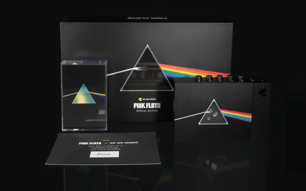Complete Pink Floyd × We Are Rewind special edition set displaying the cassette, branded cassette player, collector's box, numbered certificate, and commemorative packaging against a black background