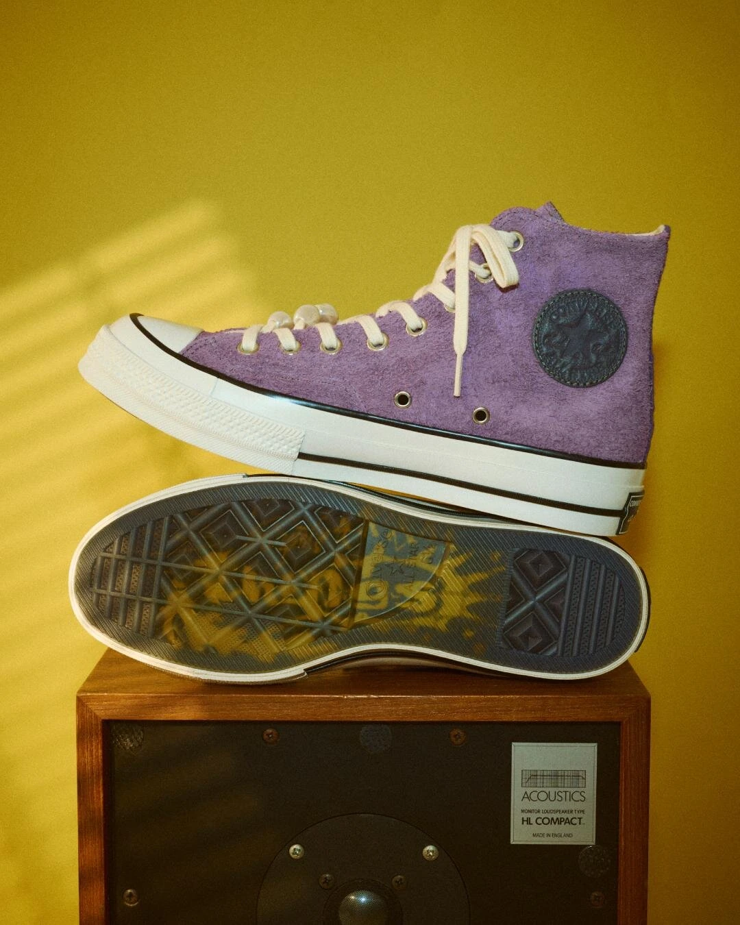 Close-Up Of Purple Suede Converse Chuck 70 High-Tops With Dark Laces And Pearl Details