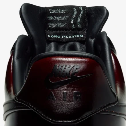 Nike Air Black And Burgundy Leather Heel Detail With Long Playing Tongue Label